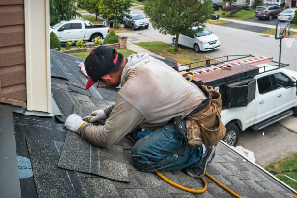Professional Roofing technician working in Amber, OK